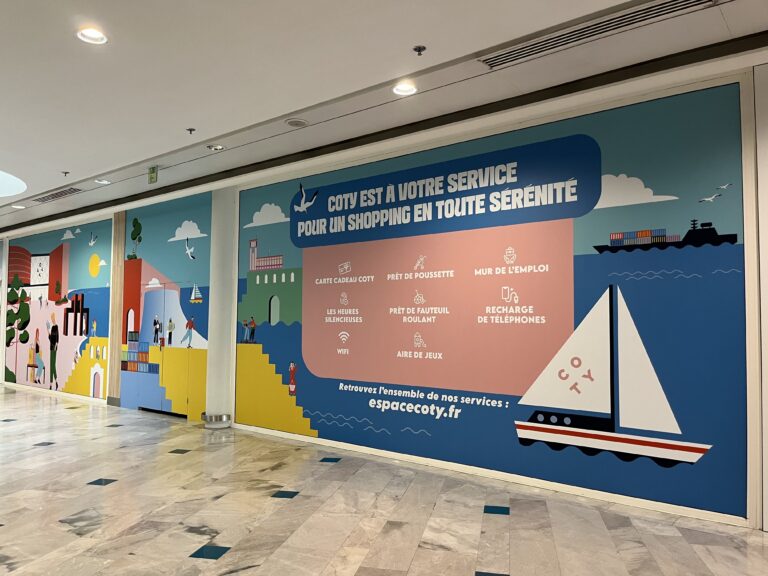 POSE PALISSADE ET POSE VINYLE SUR PALISSADE ET VITRINE CENTRE COMMERCIAL ESPACE COTY